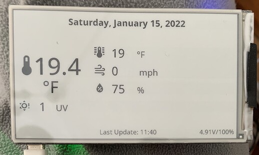 Photo of LilyGo e-paper display with date, weather, etc.